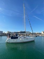 Dufour 325 Grand Large Sailing yacht Dufour 325 Grand Large 2006 in marina under clear blue sky.