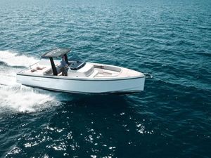 Fjord 36 2017 Fjord 36 boat cruising on open blue sea.