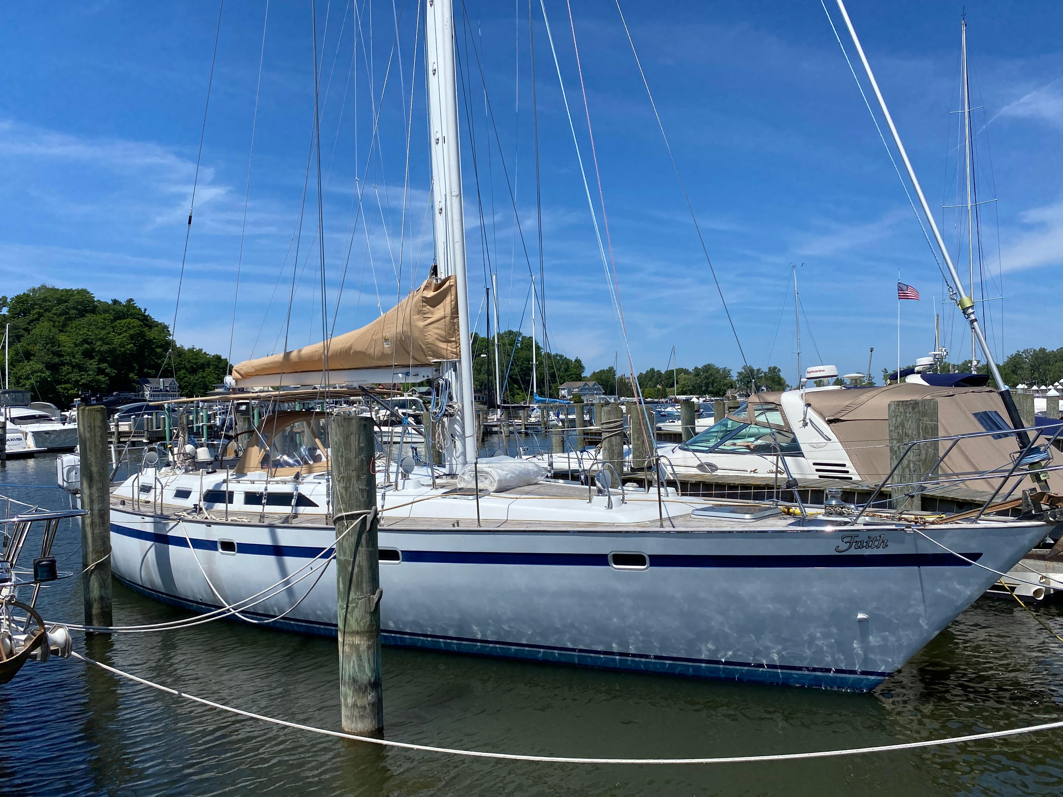 Taswell 56 Sailboat docked at marina, Taswell 56, 1991 model, clear blue sky.
