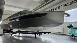 Cranchi E26 Classic 2025 Cranchi E26 Classic boat displayed indoors, showcasing sleek design and modern aesthetics.