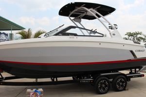 Cobalt R6 Surf 2024 Cobalt R6 Surf boat on trailer, featuring sleek design and modern features.