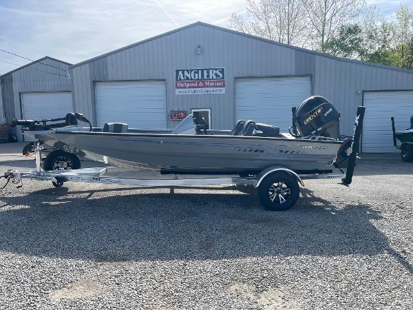 Xpress H18 2025 Xpress H18 boat on trailer outside Angler's shop.
