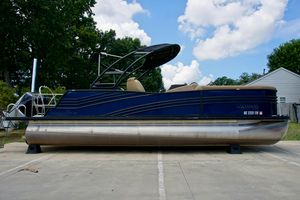 Harris Grand Mariner 230 2020 Harris Grand Mariner 230 pontoon boat on a driveway, under a blue sky.