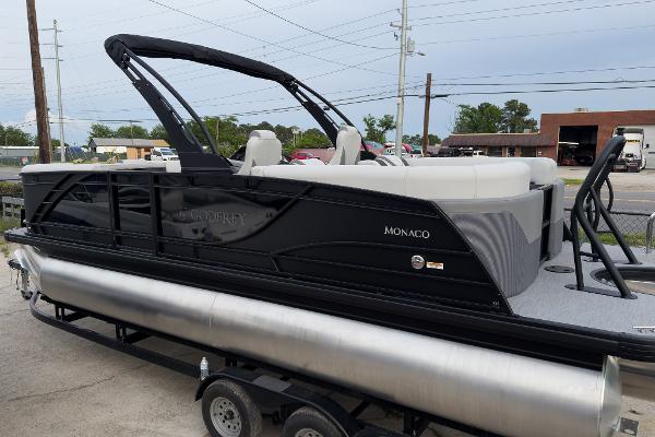 Godfrey Monaco 23' Split Bench Tritoon - 235 SB 2025 Godfrey Monaco 23' Split Bench Tritoon on trailer, featuring sleek black design.