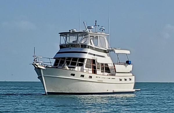 Tayana 45 Expedition Trawler 1987 Tayana 45 Expedition Trawler on calm blue sea under clear sky.