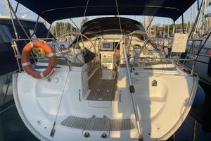Bavaria 42 Cruiser 2005 Bavaria 42 Cruiser yacht cockpit with navigation equipment and lifebuoy.
