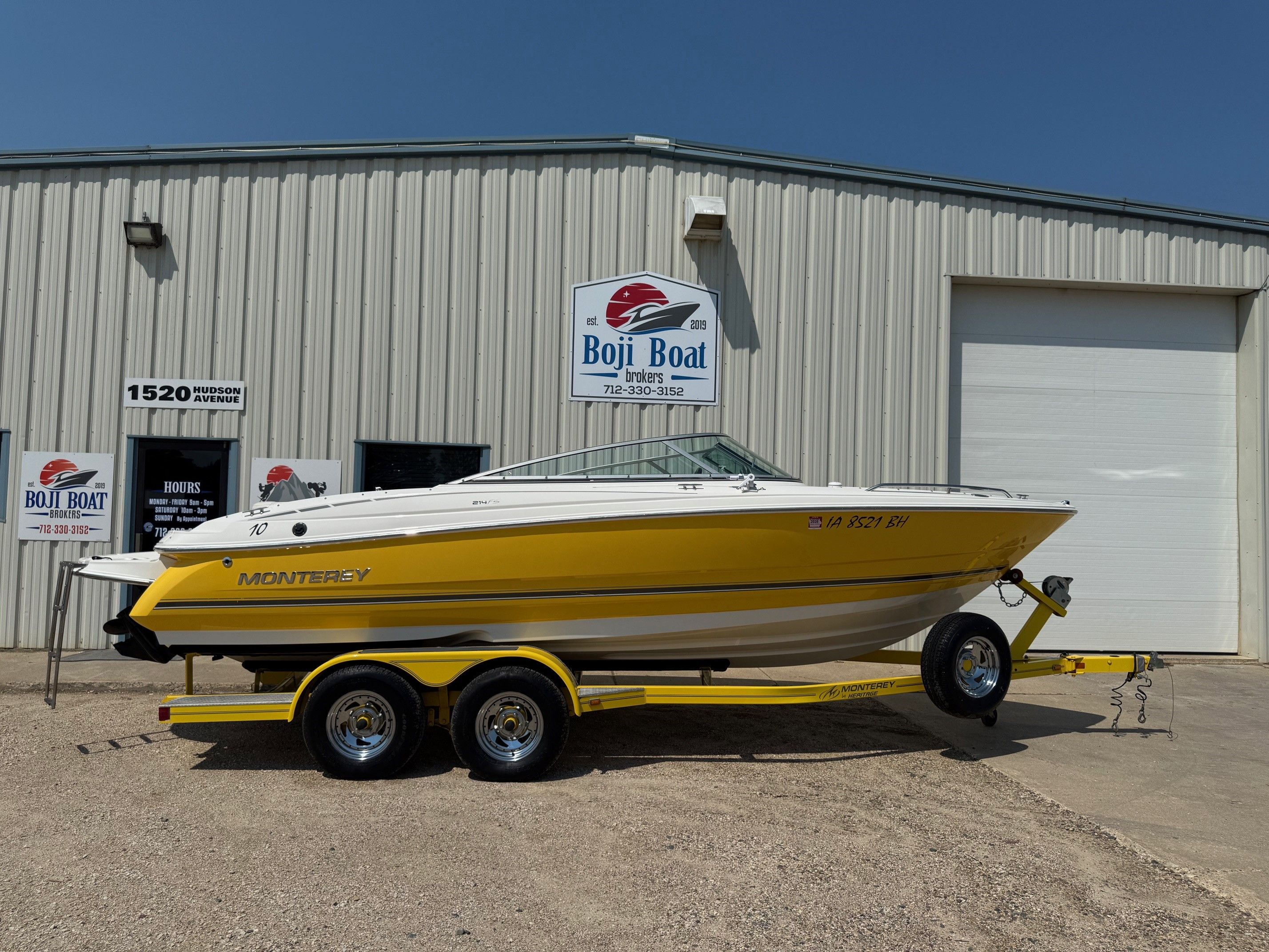 Monterey 214FS Montura 2007 Monterey 214FS Montura boat in yellow on trailer outside Boji Boat Brokers.