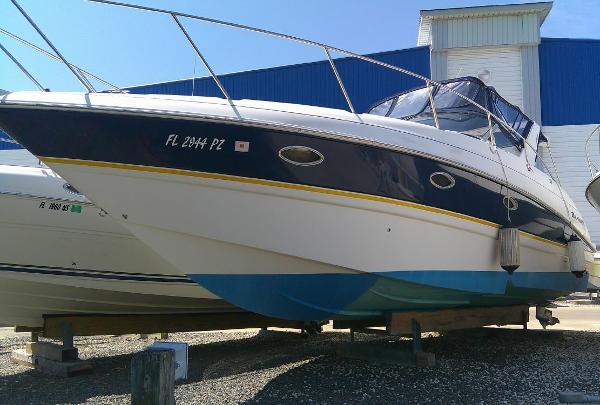 Larson Cabrio 330 2005 Larson Cabrio 330 boat on dry dock.