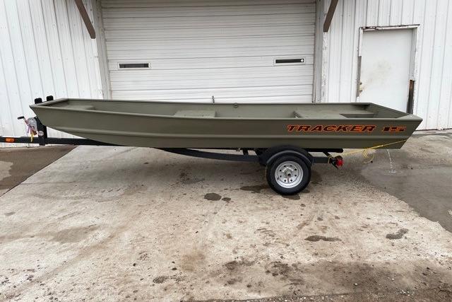 Tracker Grizzly 15 Jon 2026 Tracker Grizzly 15 Jon boat on trailer, parked outside a garage.