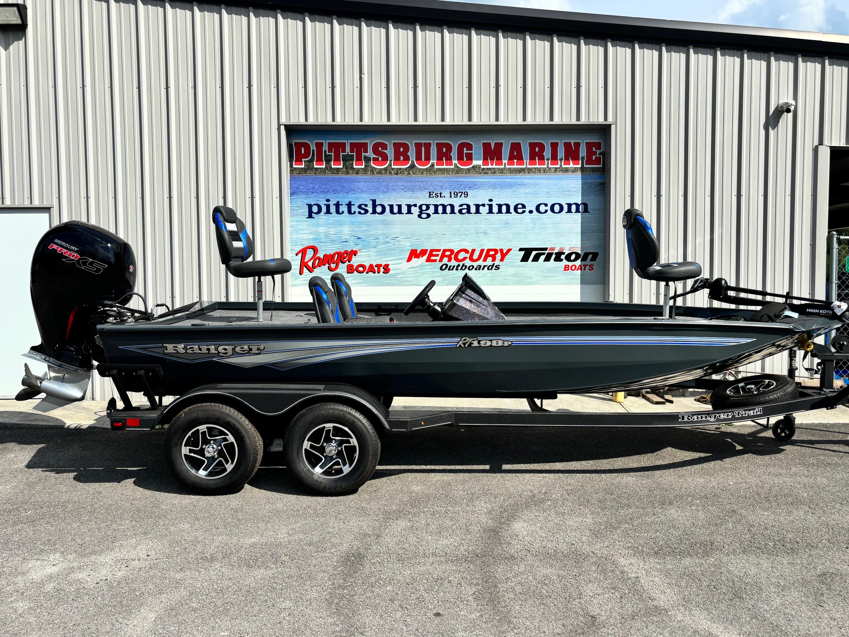 Ranger RT198P 2024 Ranger RT198P boat at Pittsburg Marine dealership, featuring sleek design and modern outboard motor.