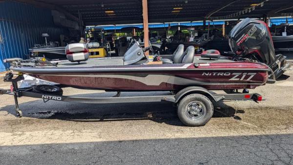 Nitro Z17 2025 Nitro Z17 boat on trailer in a covered storage area.