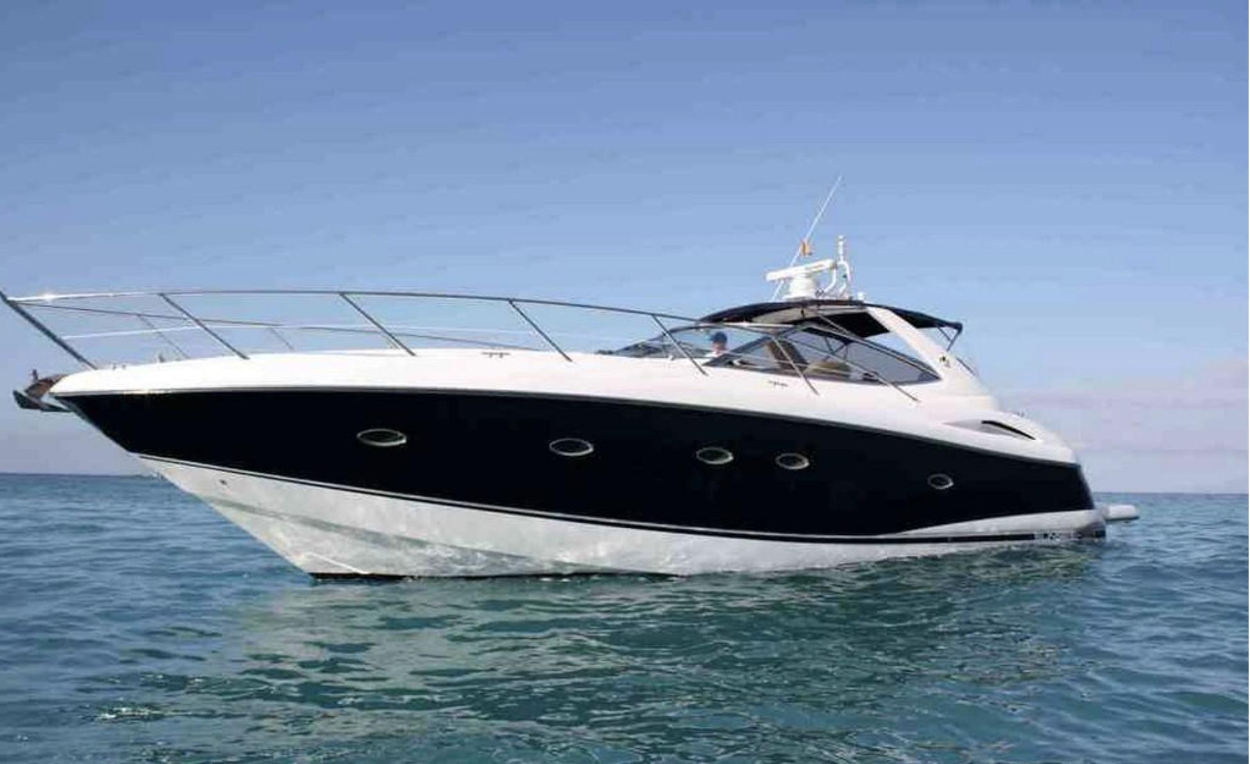 Sunseeker Portofino 46 2003 Sunseeker Portofino 46 yacht cruising on calm blue waters.