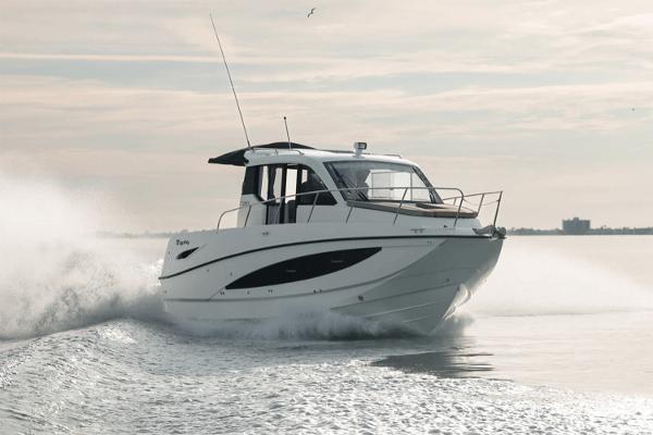 Bayliner Trophy T29 Explorer Manufacturer Provided Image: 2025 Bayliner Trophy T29 Explorer cruising on open water, creating a dynamic wake.