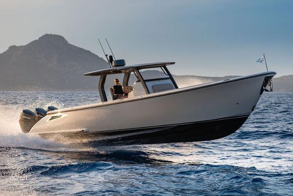 Wajer 38 S 2025 Wajer 38 S boat cruising on open water with scenic mountain backdrop.