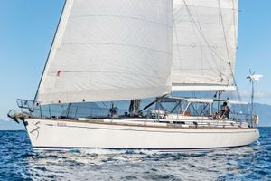 Nautor Swan 60 Sailing yacht Nautor Swan 60, 2000 model, cruising on open sea with full sails.