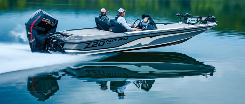 Nitro Z20 XL Pro 2026 Nitro Z20 XL Pro boat speeding on calm water, showcasing sleek design and powerful engine.
