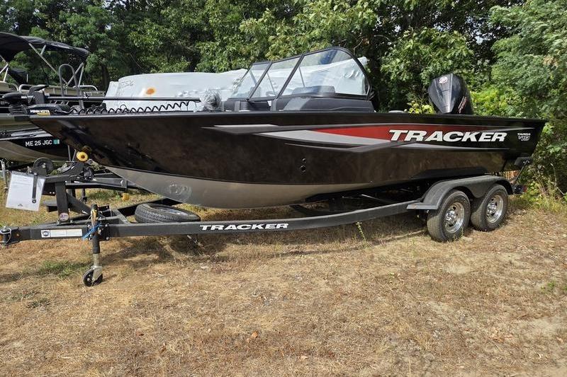 Tracker Targa V-19 WT Tournament Edition 2026 Tracker Targa™ V-19 WT boat on trailer, parked outdoors.