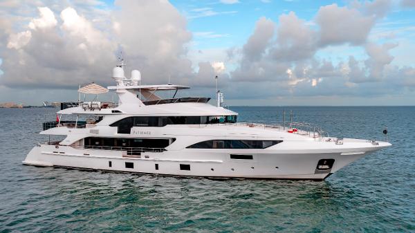 Benetti Classic Supreme 132 Luxury yacht Benetti Classic Supreme 132, 2012 model, cruising on open water under a cloudy sky.