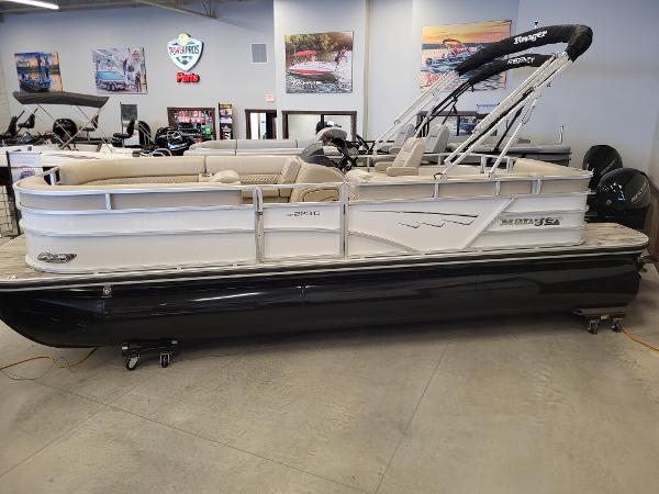 Ranger Reata 223C 2024 Ranger Reata 223C pontoon boat in showroom.
