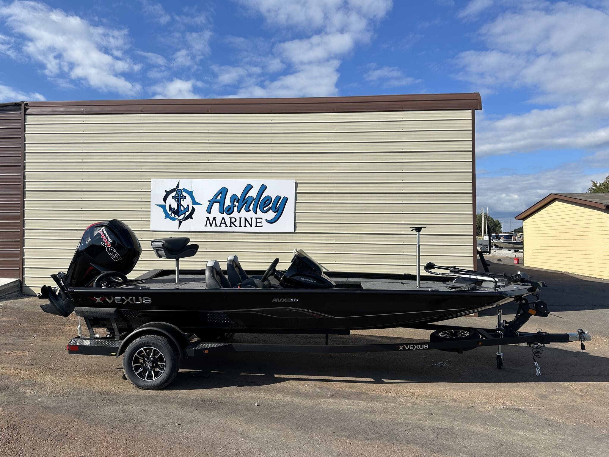 Vexus Defender 189 2026 Vexus Defender 189 boat at Ashley Marine dealership, parked outdoors.