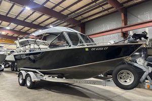 North River 21 Seahawk 2008 North River 21 SEAHAWK boat on trailer in indoor storage facility.