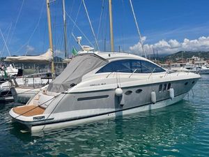 Absolute 47 HT 2008 Absolute 47 HT yacht docked in a marina, clear skies, calm waters.