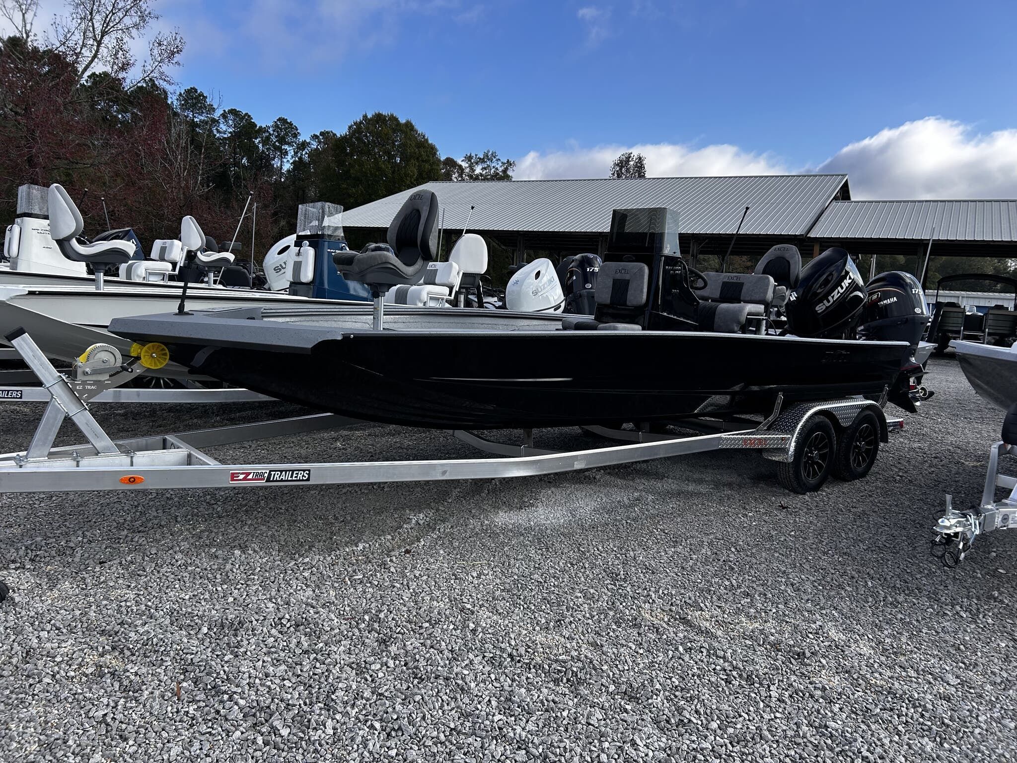 Excel Bay Pro 220 220 ELITE 2026 Excel Bay Pro 220 ELITE on trailer outdoors.