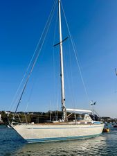 Nautor Swan Swan 38 1978 Nautor Swan 38 sailboat on calm water under clear blue sky.