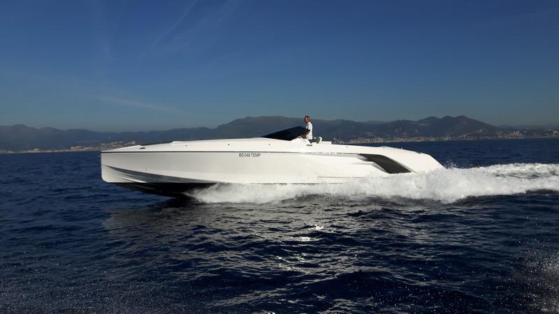 Frauscher 1414 Demon 2016 Frauscher 1414 Demon yacht cruising on open water with mountains in the background.