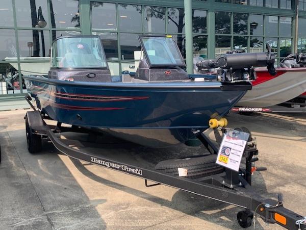 Ranger VS1782SC Angler 2023 Ranger VS1782SC Angler boat on trailer, displayed outdoors.