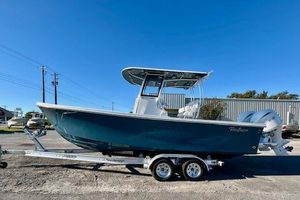 Pair Customs 24 Center Console DV Offshore 2026 Pair Customs 24 Center Console DV Offshore boat on trailer, side view.