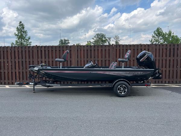 Ranger RT188C 2024 Ranger RT188C boat parked outdoors, featuring sleek design and modern seating.