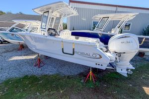 Robalo R250 Center Console 2024 Robalo R250 Center Console boat displayed outdoors on stands.