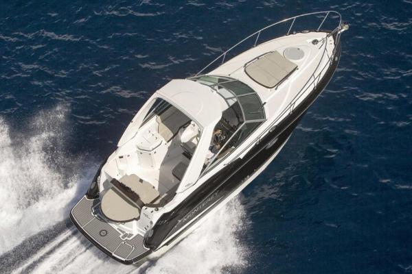 Monterey 295 Sport Yacht 2020 Monterey 295 Sport Yacht cruising on open water, aerial view.
