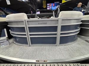 Harris Sunliner 230 CWDH 2025 Harris Sunliner 230 CWDH pontoon boat, rear view with seating and branding.