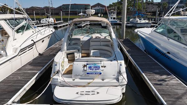 Sea Ray 320 Sundancer 2004 Sea Ray 320 Sundancer docked at marina, rear view.