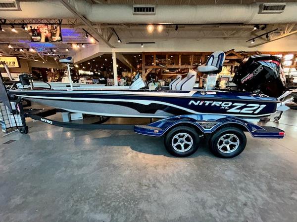Nitro Z21 XL 2025 Nitro Z21 XL boat displayed indoors on a trailer.
