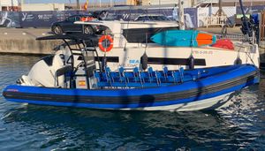 Astec pb800 Astec PB800 boat, 2004 model, docked with blue and black design, featuring multiple seats.