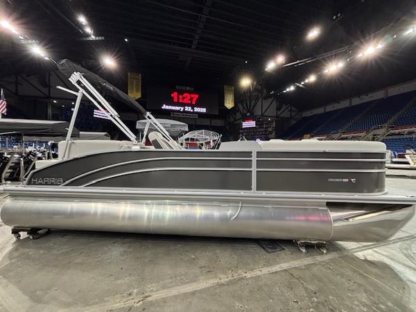 Harris Cruiser 230 2025 Harris Cruiser 230 pontoon boat displayed indoors with modern design.