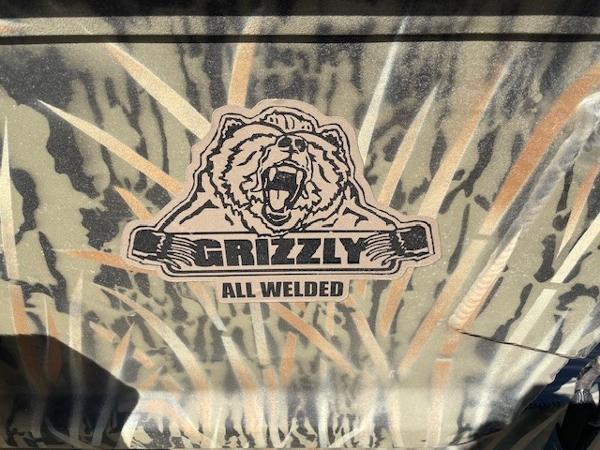 Tracker Grizzly 1860 CC 2025 Tracker Grizzly 1860 CC boat logo with camouflage design.