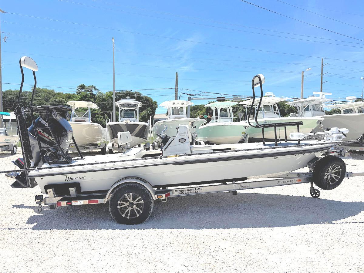 Maverick 18 HPX-V 2021 Maverick 18 HPX-V boat on trailer in a sunny outdoor showroom.