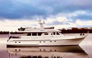 Moonen 72 Moonen 72 yacht from 1987 on calm water under a cloudy sky.