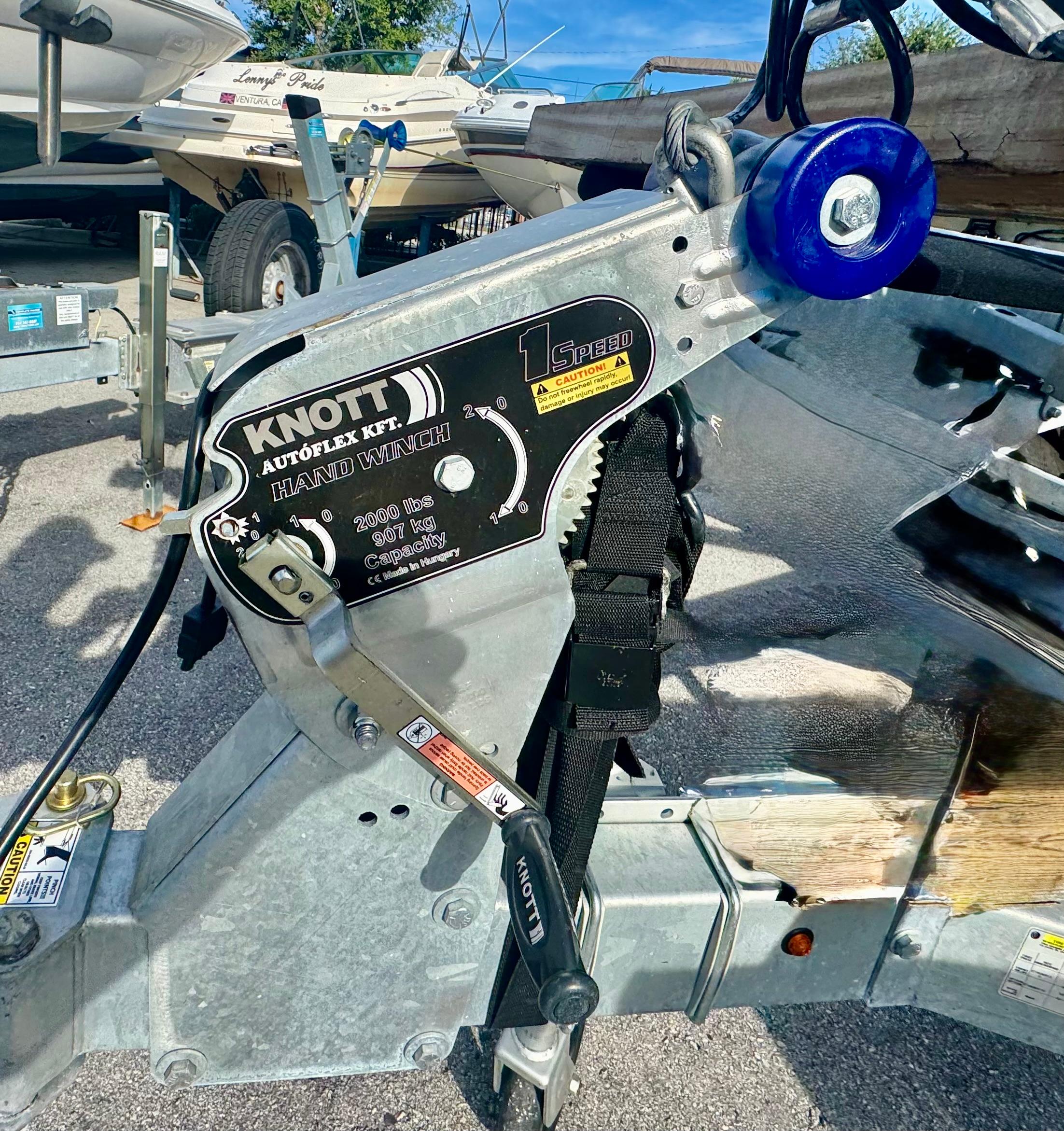 Trailer KARAVAN TRAILER 17-22 W/Folding tongue & brakes on all 4 tires Hand winch on 2024 KARAVAN 17-19 trailer, featuring Knott Autóflex KFT, 2000 lbs capacity.