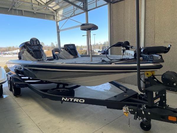 Nitro Z21 XL 2025 Nitro Z21 XL boat on trailer in covered area.
