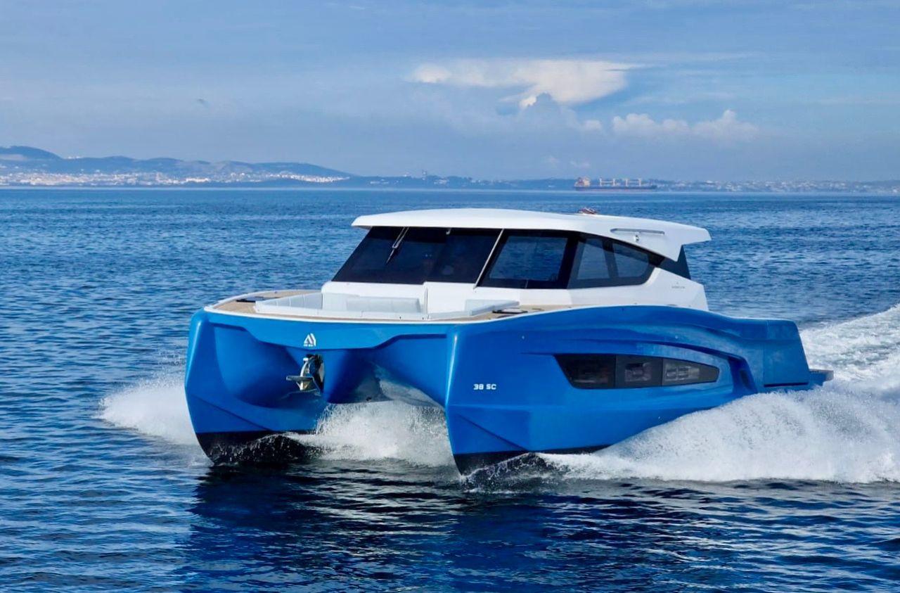 Aventura 38 SC Aventura 38 SC 2026 catamaran cruising on open water, showcasing sleek design and performance.