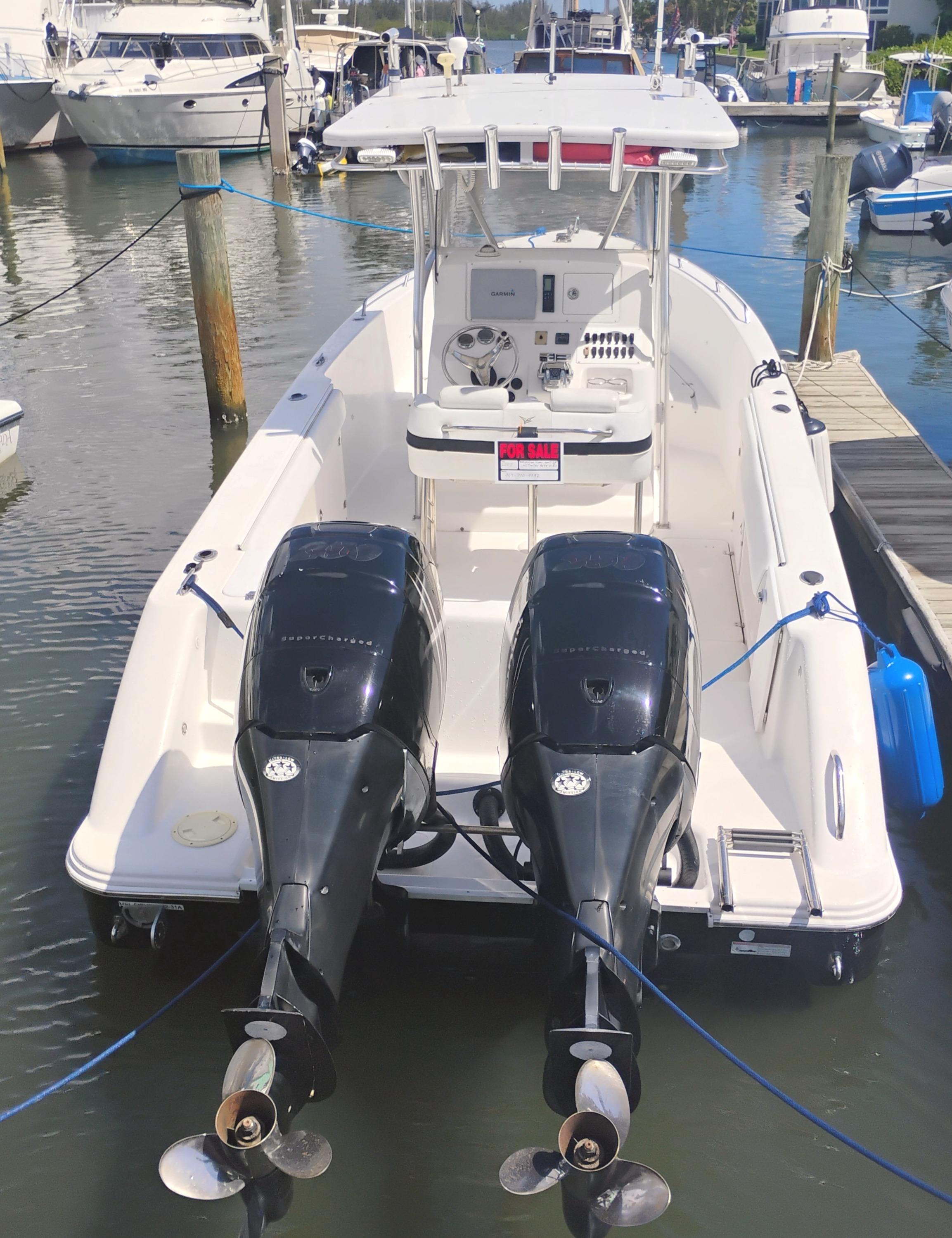 Pro-Line 29 Super Sport 2007 Pro-Line 29 Super Sport boat with dual outboard motors docked at marina.