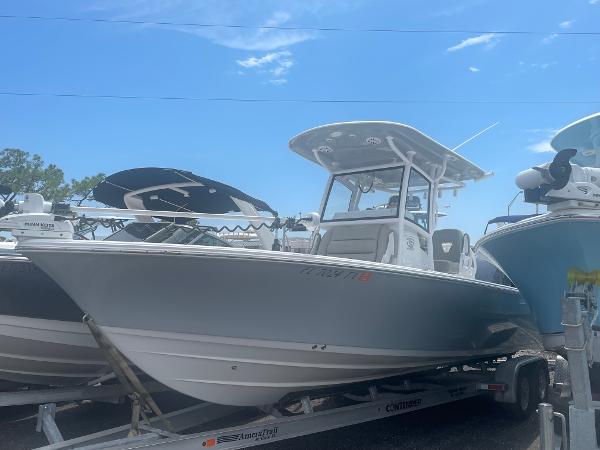 Sportsman Masters 267OE Bay Boat 2021 Sportsman Masters 267OE Bay Boat on trailer under blue sky.