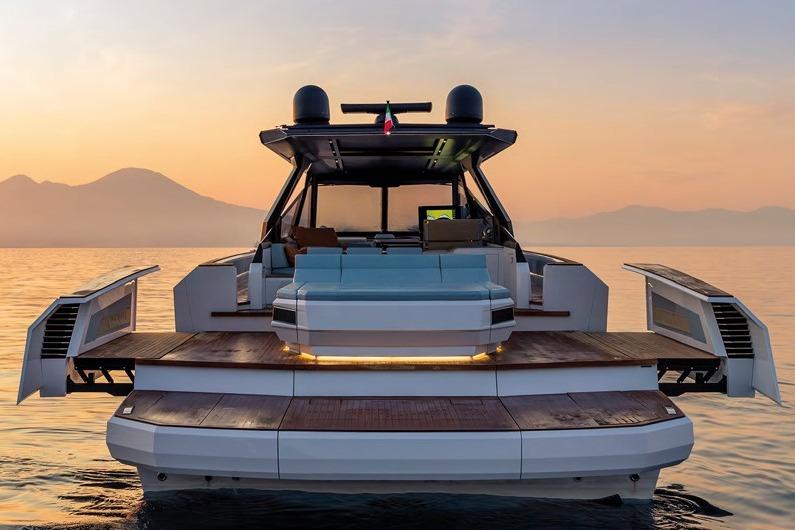 Evo Yachts R6 2026 Evo Yachts R6 at sunset, showcasing sleek design and luxurious features on calm waters.