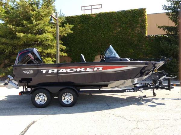 Tracker Targa V-18 WT 2025 Tracker Targa V-18 WT boat on trailer, parked outdoors.