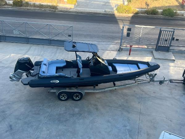 Seafighter Ultimeight 28 2024 Seafighter Ultimeight 28 boat on trailer, parked outdoors.
